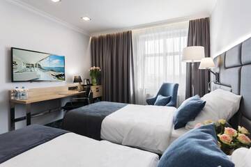 Фото номера Двухместный номер Делюкс с 2 отдельными кроватями Апарт-отели Hotel Włoski Boutique Centrum Poznań г. Познань 5