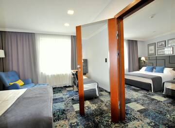 Фото номера Семейный номер Апарт-отели Hotel Włoski Boutique Centrum Poznań г. Познань 5